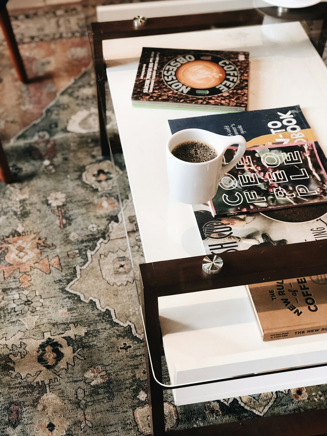 Stack of printed newspapers and magazines on a table