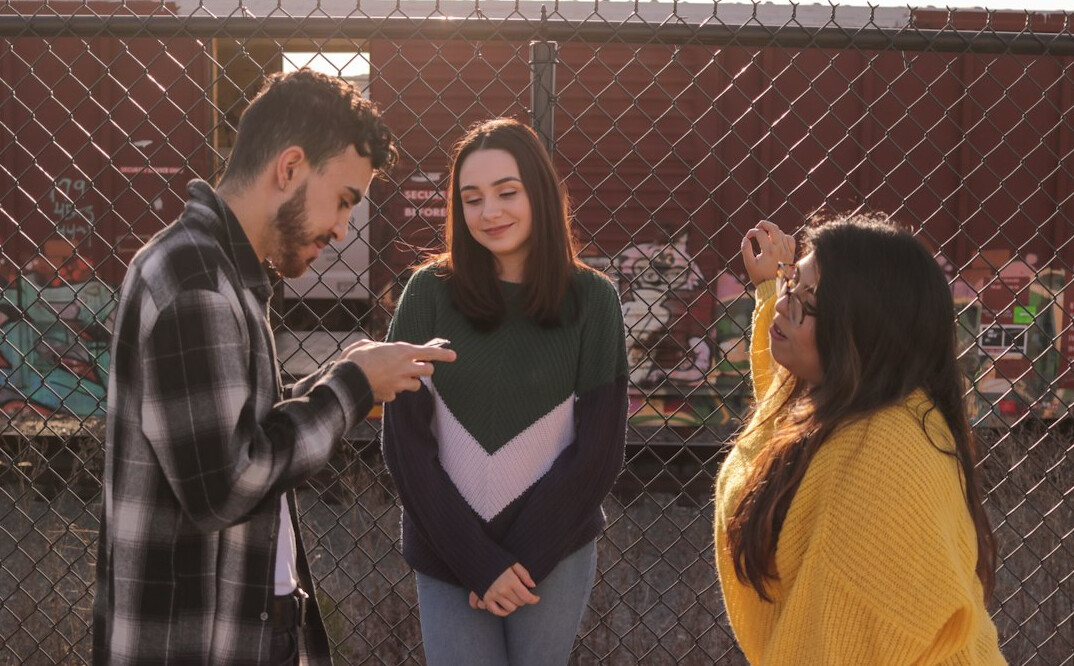 diverse group of young adults talking