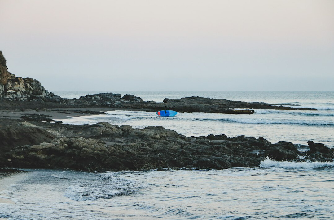 Small fishing cove on the Chilean coast at sunset