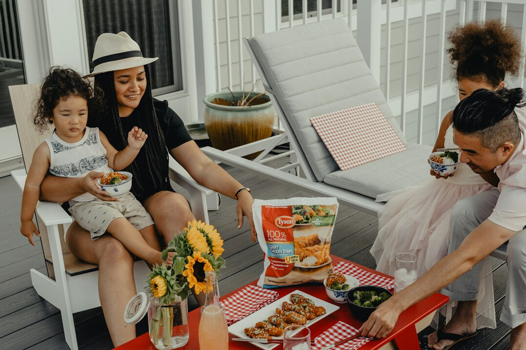 family enjoying picnic outdoors